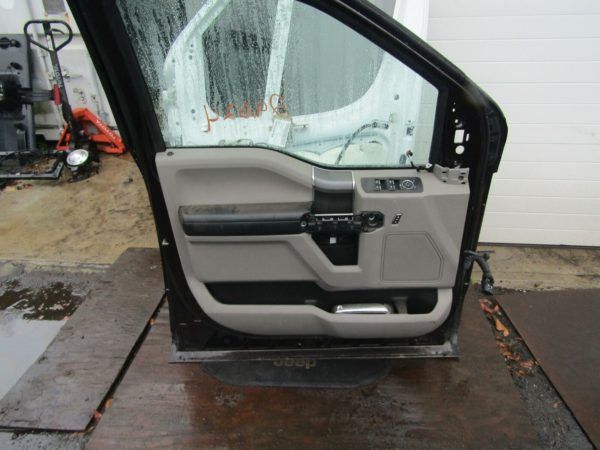 Ford Superduty 15-19 front left door with panel and handle.