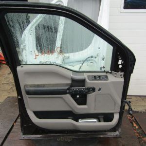 Ford Superduty 15-19 front left door with panel and handle.