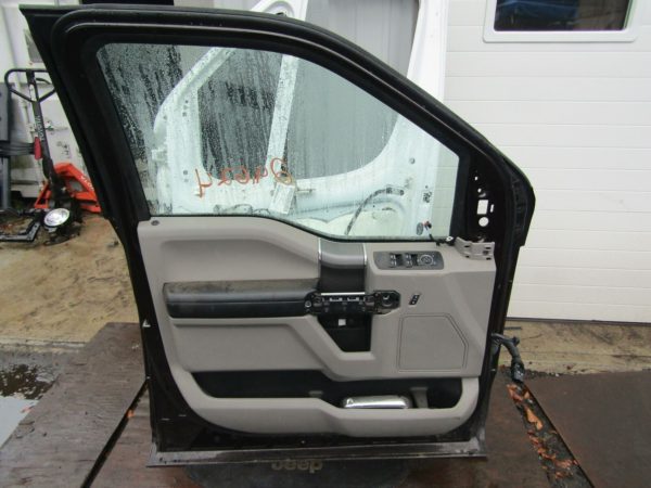 Ford Superduty 15-19 front left door with panel and handle.